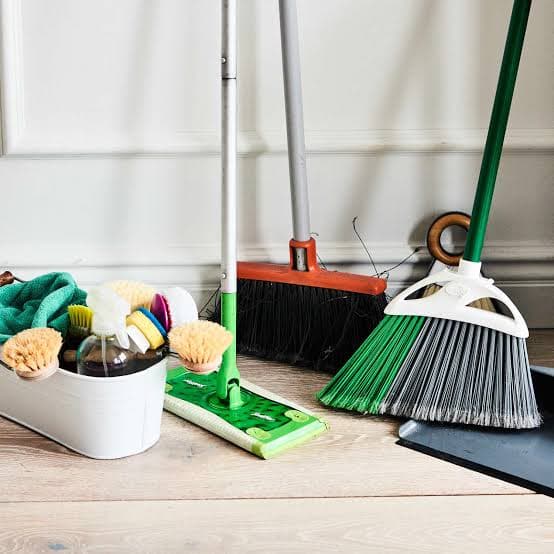 Nexora team member organizing eco-friendly cleaning supplies before a job